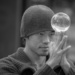 Young man and crystal ball by gosia