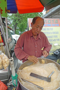 13th Jun 2014 - Street vendor selling tingting candy