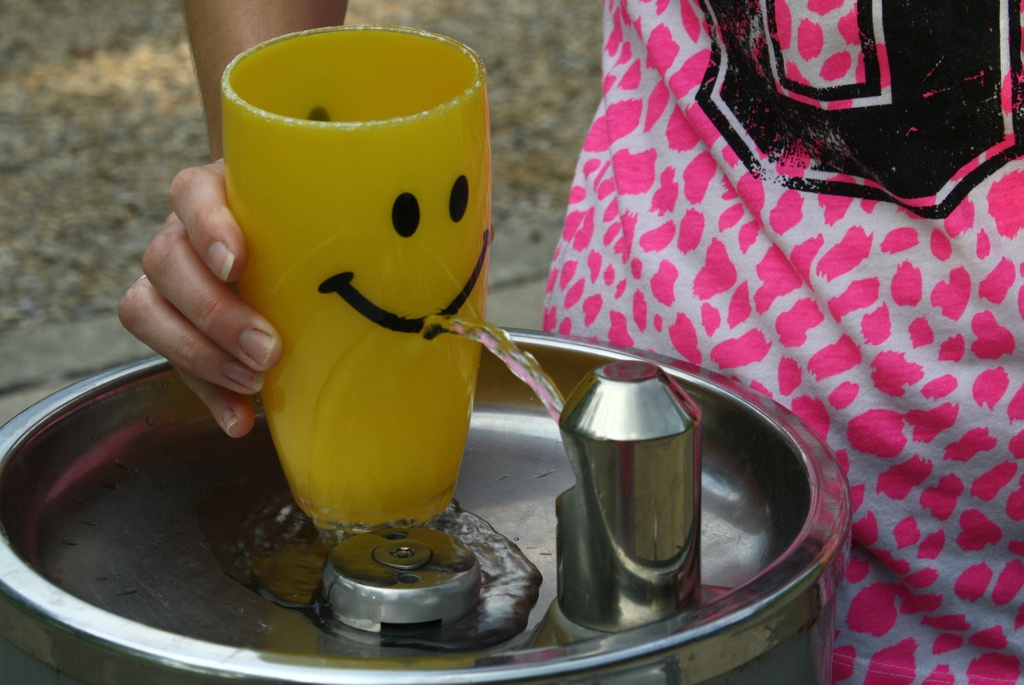 Smiley Cup getting a drink by mittens