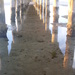 Reflection under the pier by marguerita