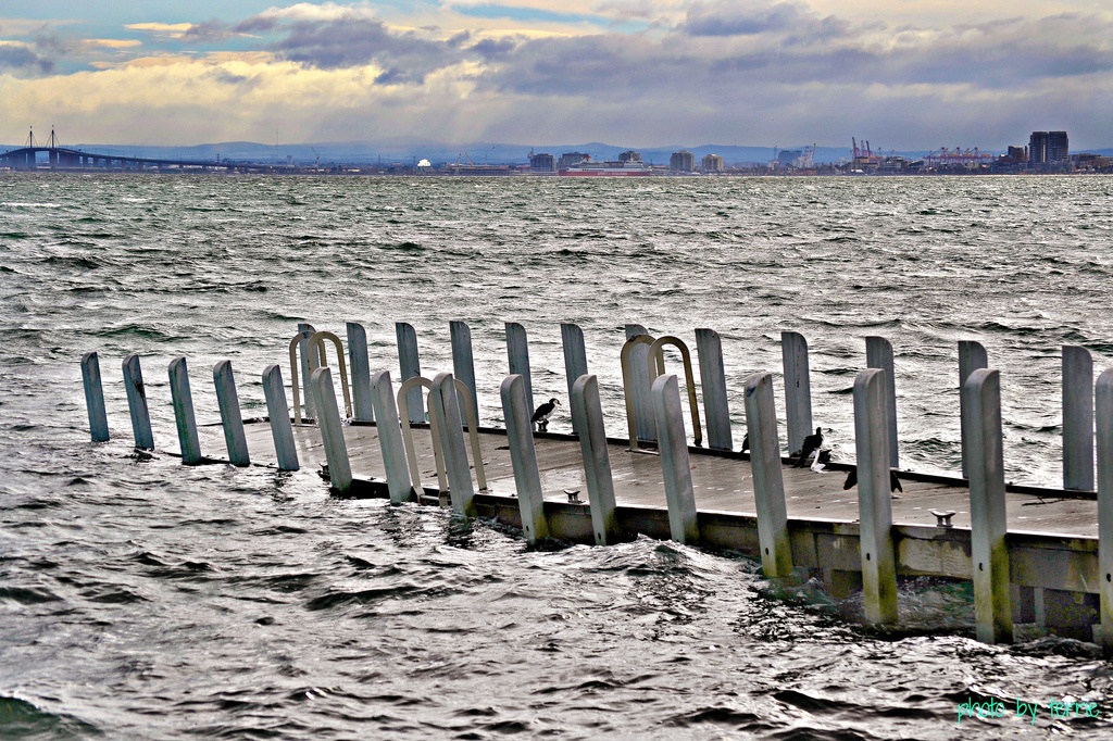 Wild weather breaks piers by teodw