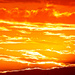 Fiery sunset by sugarmuser
