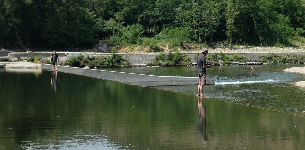 Fishing on the weir by nix