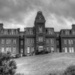 B&W campus building by mittens