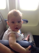 9th Jul 2014 - Baby got her own seat on the plane. 