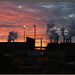 Steel mill at sunset by dide