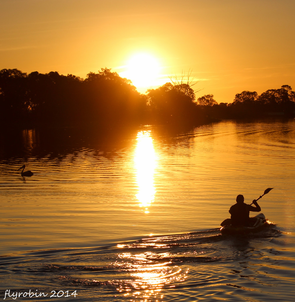 Kayaking off into the sunset by flyrobin