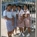 happy Honiara schoolgirls by cruiser