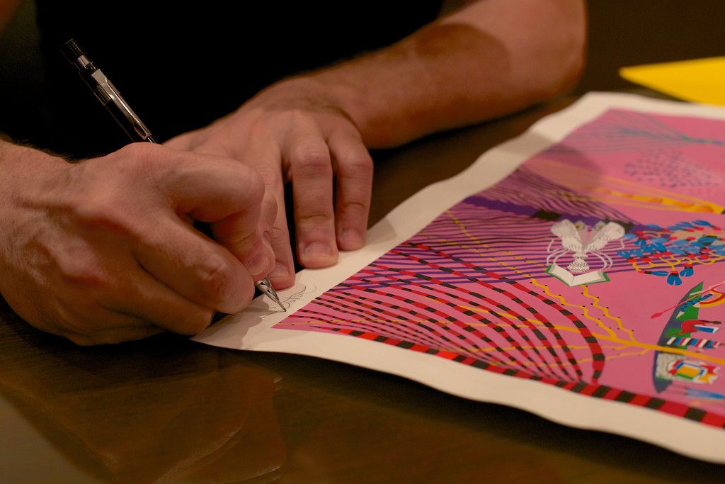 Roger Mello Signs His Art by jyokota