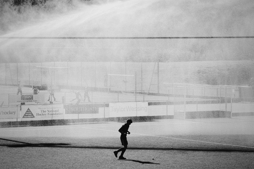 Watering the pitch by judithg