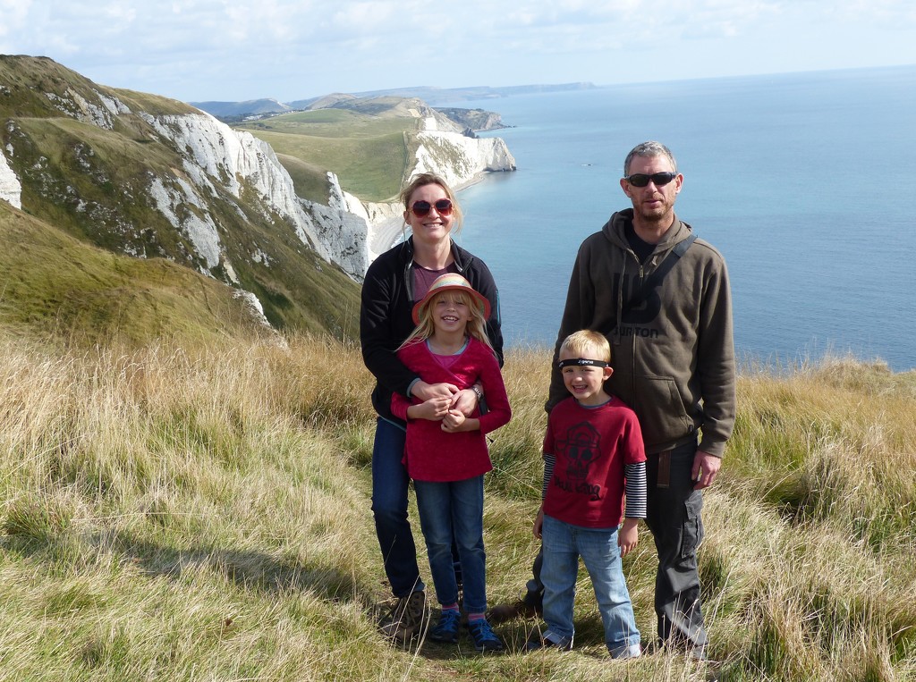 Number 1 Son and Family at Ringstead Bay by susiemc