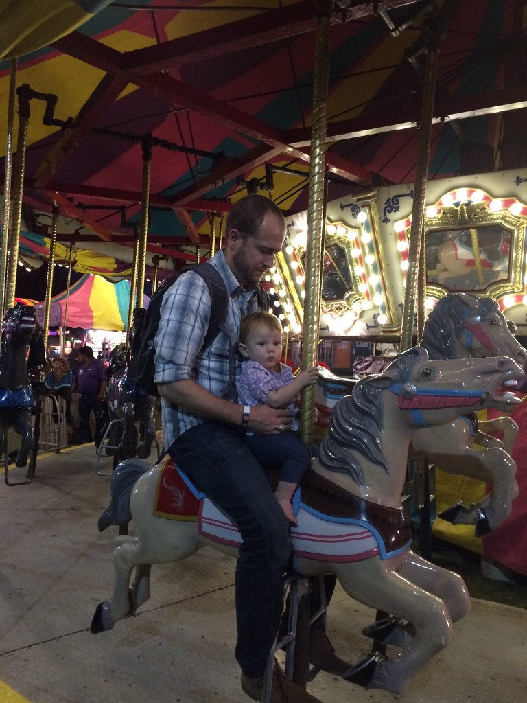 Carousel ride with her dad.  by doelgerl