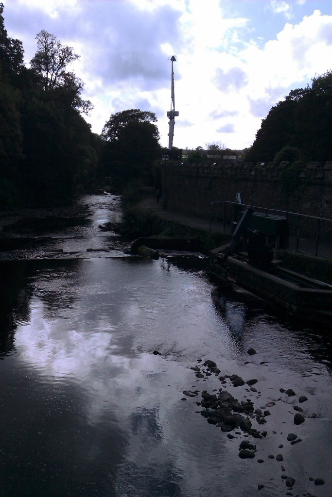 River Tavy with fair ride in back ground by jennymdennis
