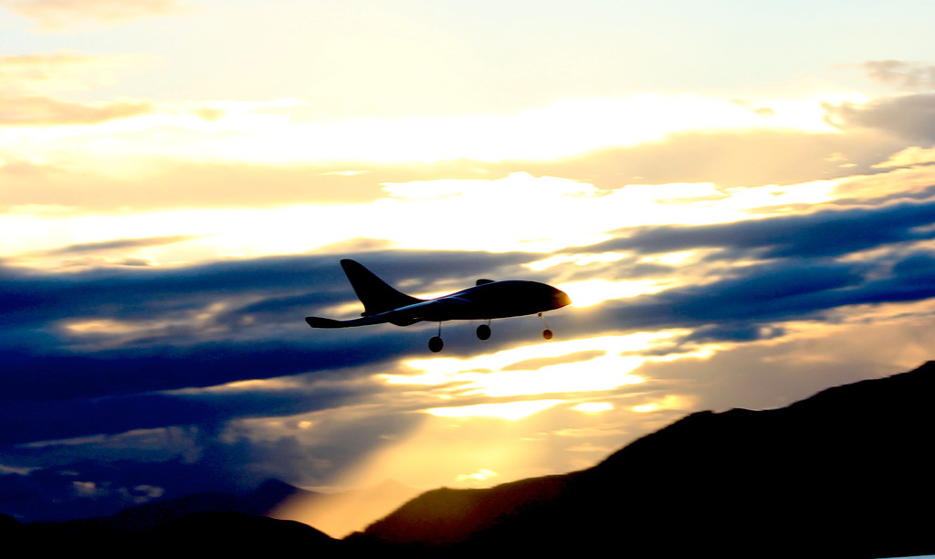 Silhouette skyplane by kiwinanna
