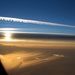 Sunrise from Airplane Window by jyokota