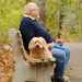 A Puff and a Pooch: A Moment of Respite on the Bench by alophoto