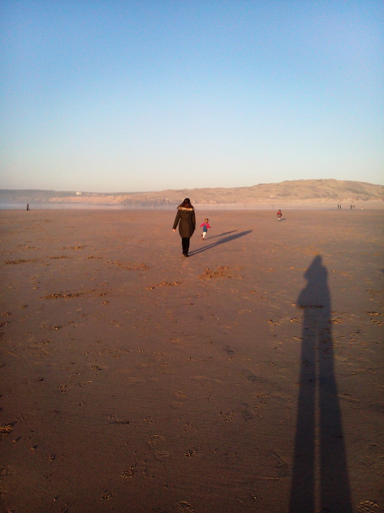 Chasing shadows on Gwithian beach. by jennymdennis