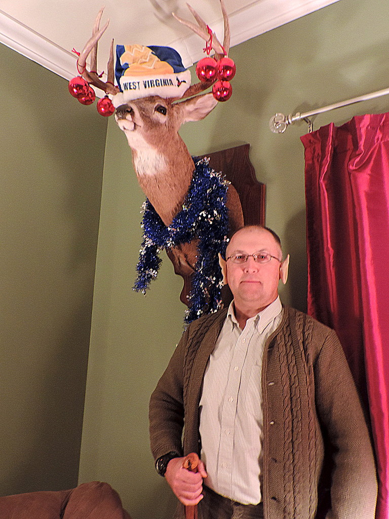 The Hobbit and his prized Christmas deer! by homeschoolmom