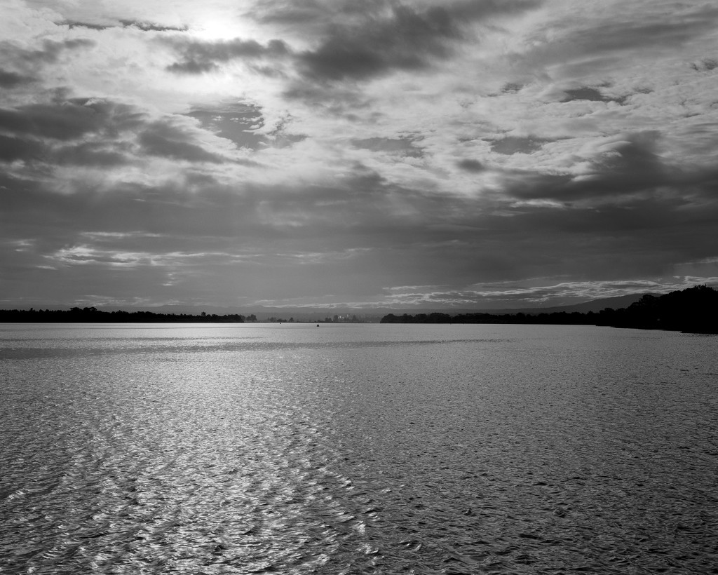 Cloudy summer evening on the Shoalhaven River by peterdegraaff