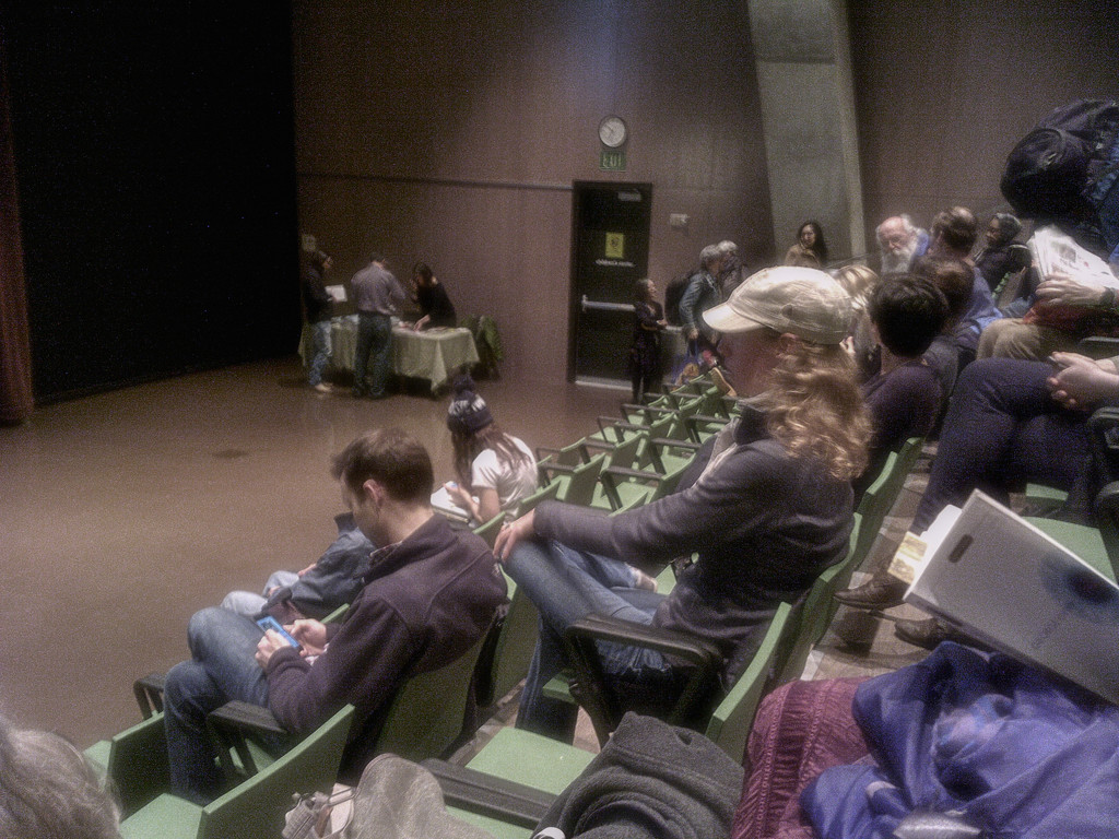 At The Seattle Library Waiting To Hear The Lecture  It's What I Do: A Photographer's Life of Love and War by Lynsey Addario.   by seattle