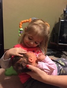 8th Mar 2015 - Loves holding her baby sister
