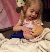 16th Apr 2015 - Rocking her doll to sleep 