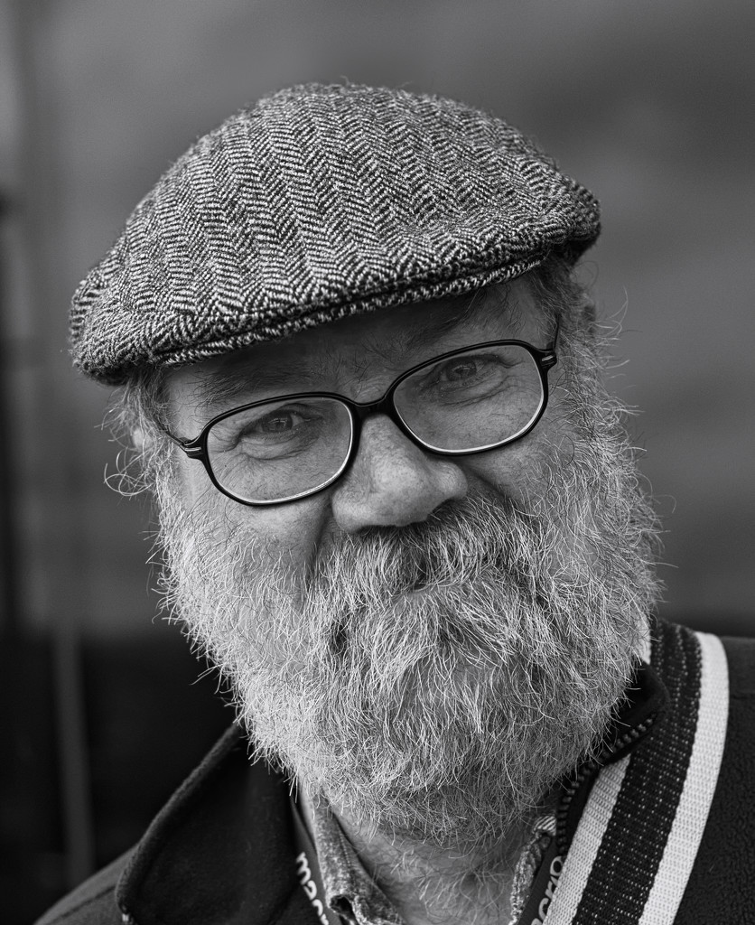 50 mono portraits at 50mm : No. 34 : Flat Cap, Glasses and Beard by phil_howcroft