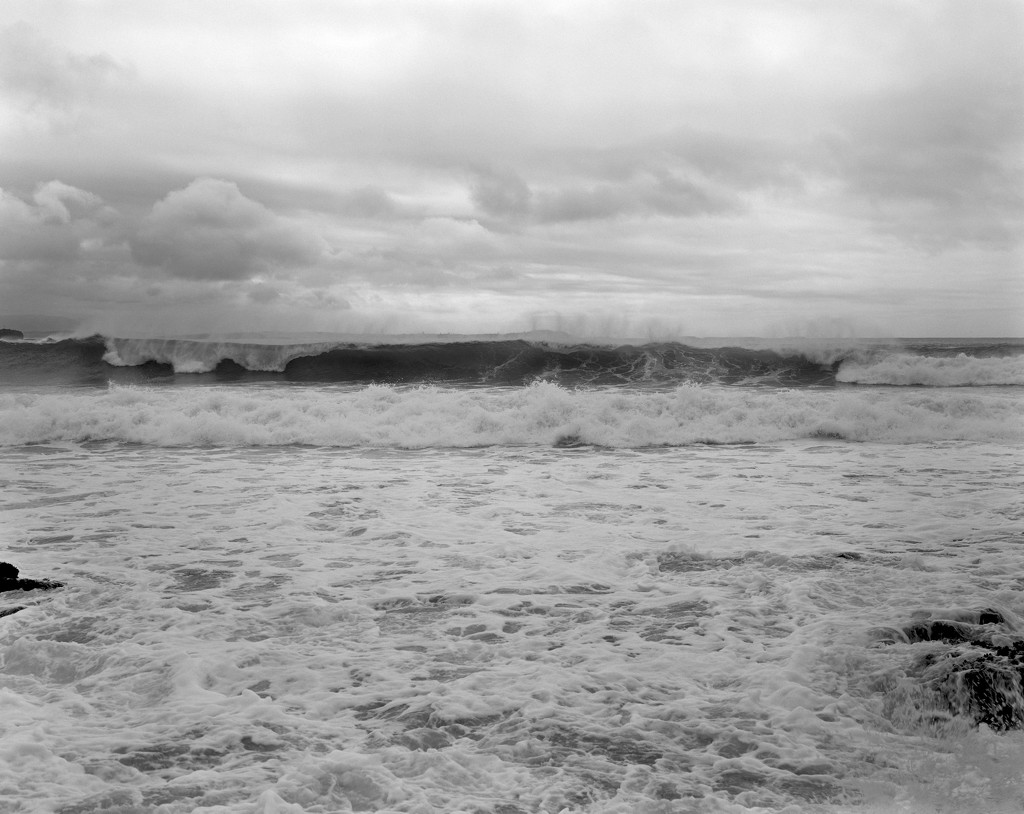 Surf, spray and clouds by peterdegraaff