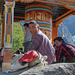 Sherpas rest at prayer wheel by ianjb21
