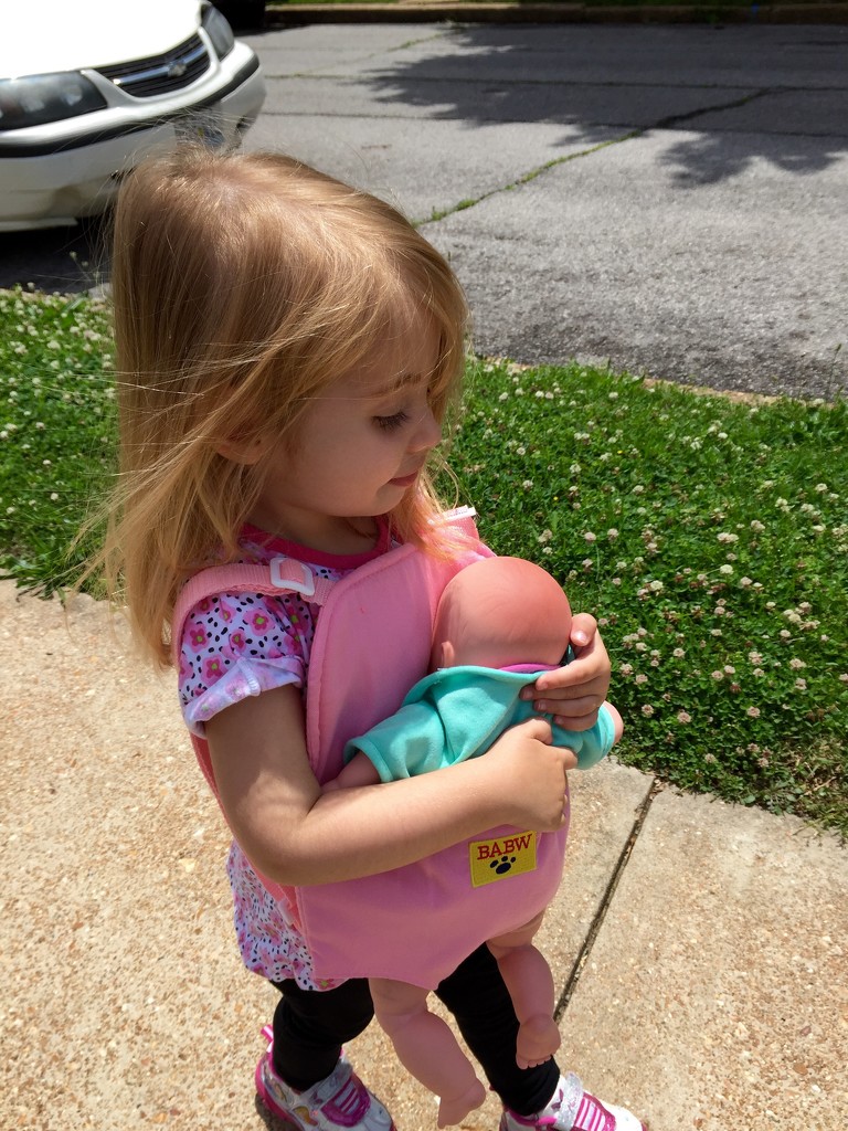 Wearing her baby on a walk just like mommy by mdoelger