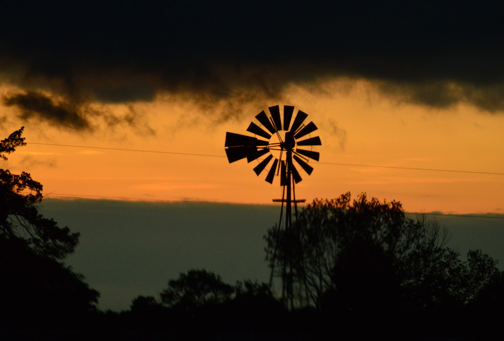 Cloud Hovers Over Windmill by kareenking