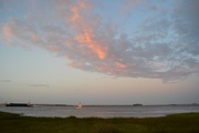 16th Jun 2015 - Sailboat, barge and container ship in Charleston Harbor at sunset, Charleston, SC.  This was taken at Waterfront Park and there were many vessels of great variety in the Harbor that afternoon.