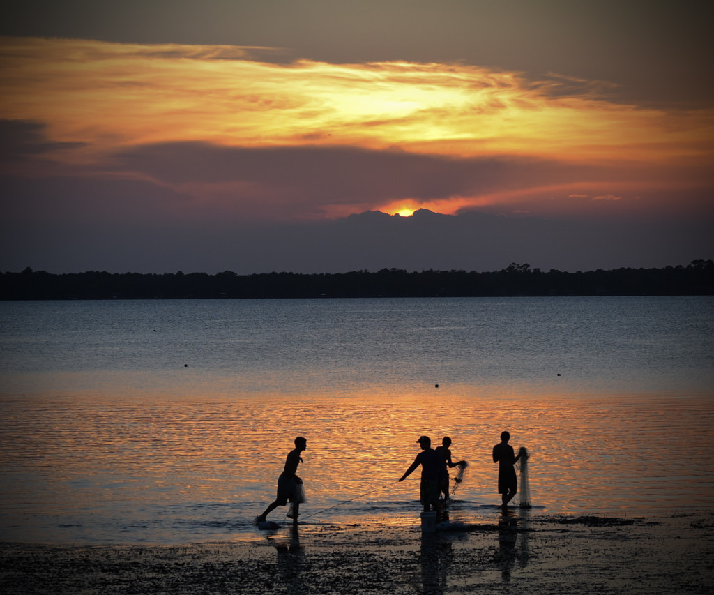 Boys fishing at sunset by rickster549
