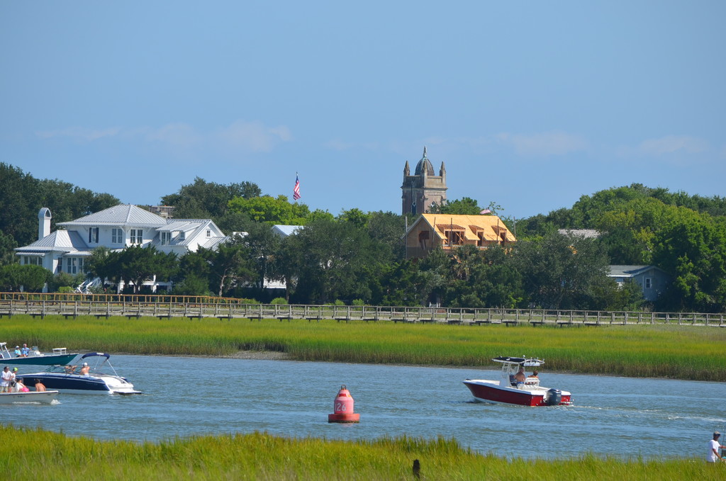 Town of Sullivan's Island, SC, from the Pitt Street Bridge in Mount Pleasant on a hot summer afternoon. by congaree