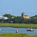 Town of Sullivan's Island, SC, from the Pitt Street Bridge in Mount Pleasant on a hot summer afternoon. by congaree