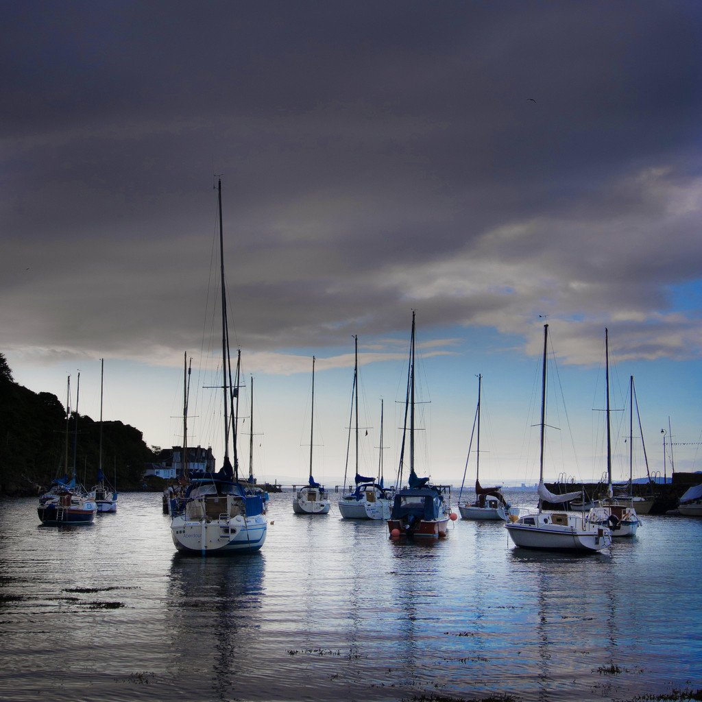 Dark cloud over the harbour by frequentframes