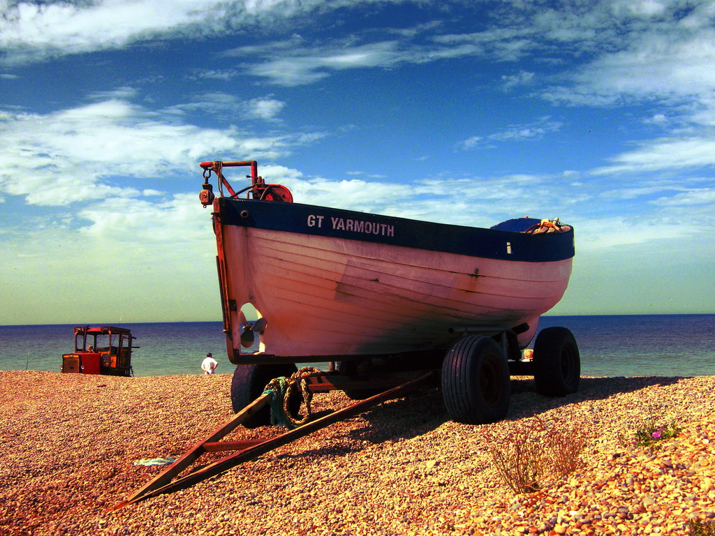 Boat on a beach by jeff