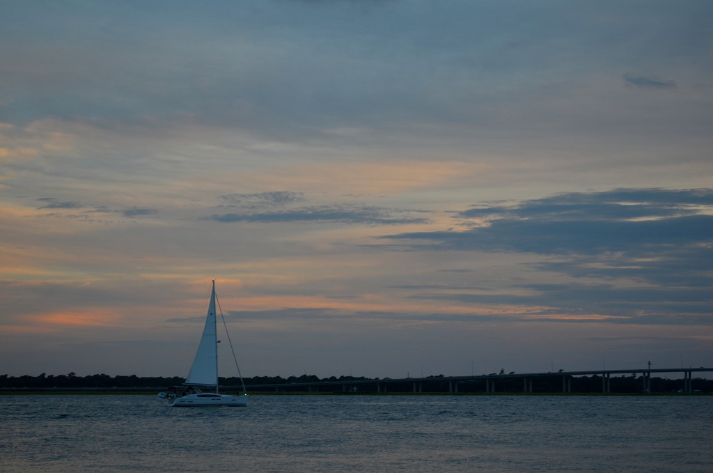 Sailboat at sunset, The Battery at the Ashley River, Charleston, SC by congaree