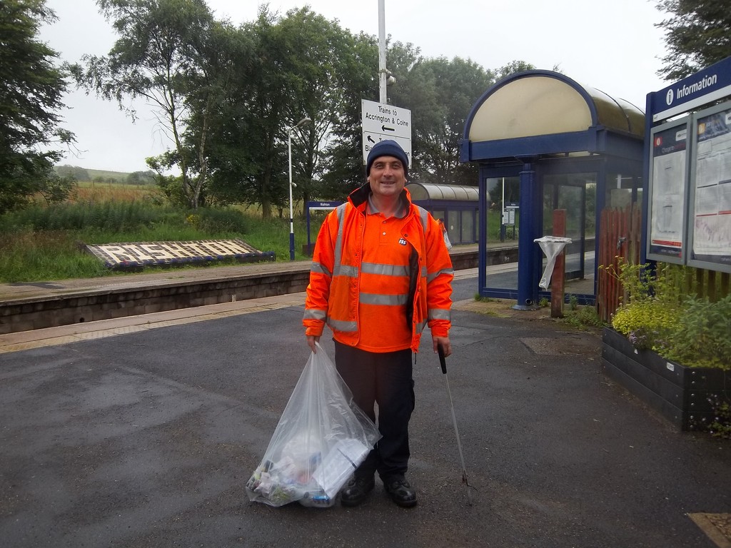 Mark cleaning up our railway station. by grace55