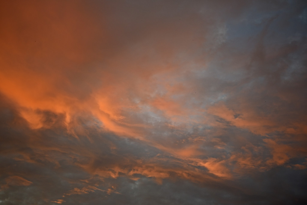 Red dawn clouds by ianjb21
