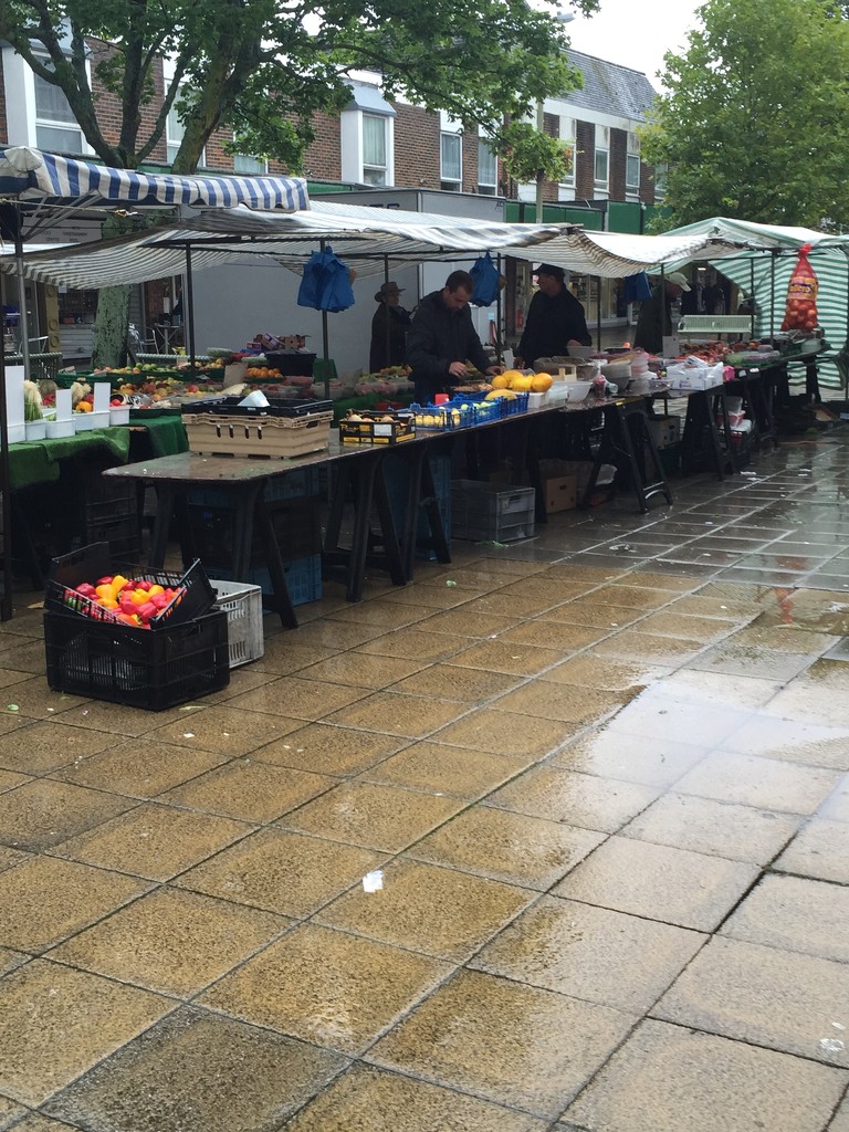Portchester Market In The Rain by davemockford