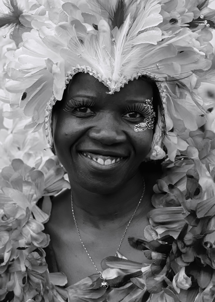 50 mono portraits at 50mm : No. 49 : Carnival Smile  by phil_howcroft