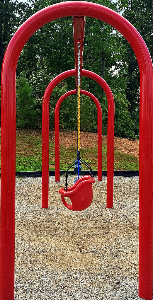 Red swings! by homeschoolmom