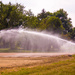 Watering the newly plowed field by hjbenson