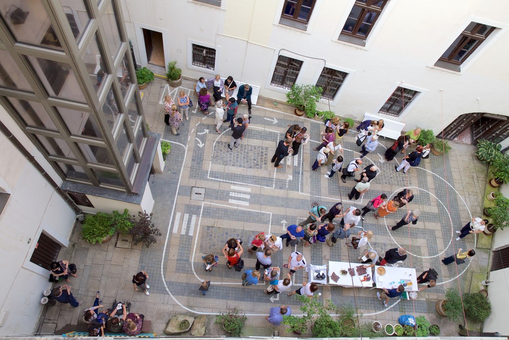 Looking Down at Courtyard Party  by jyokota