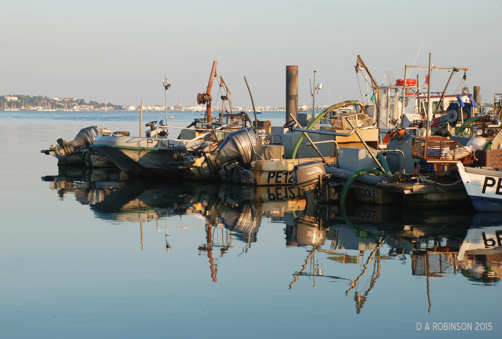 Fishing Boat Reflections by davidrobinson