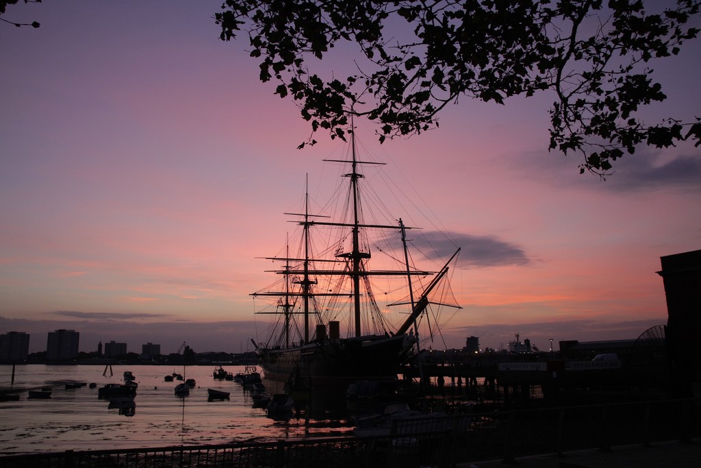Sunset over HMS Warrior by davemockford