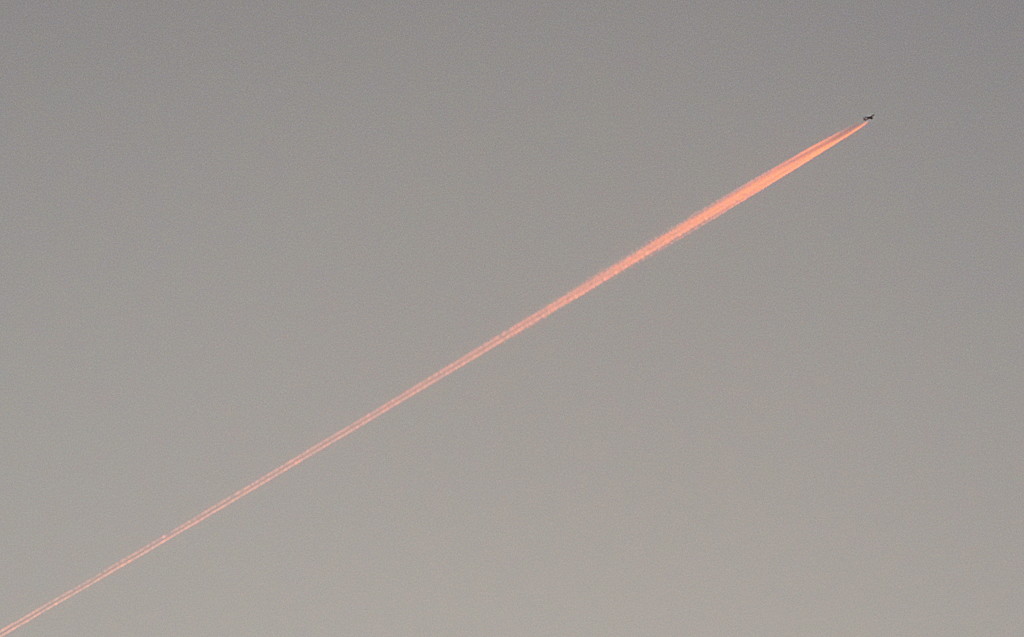Jet Trails in the sunset by homeschoolmom