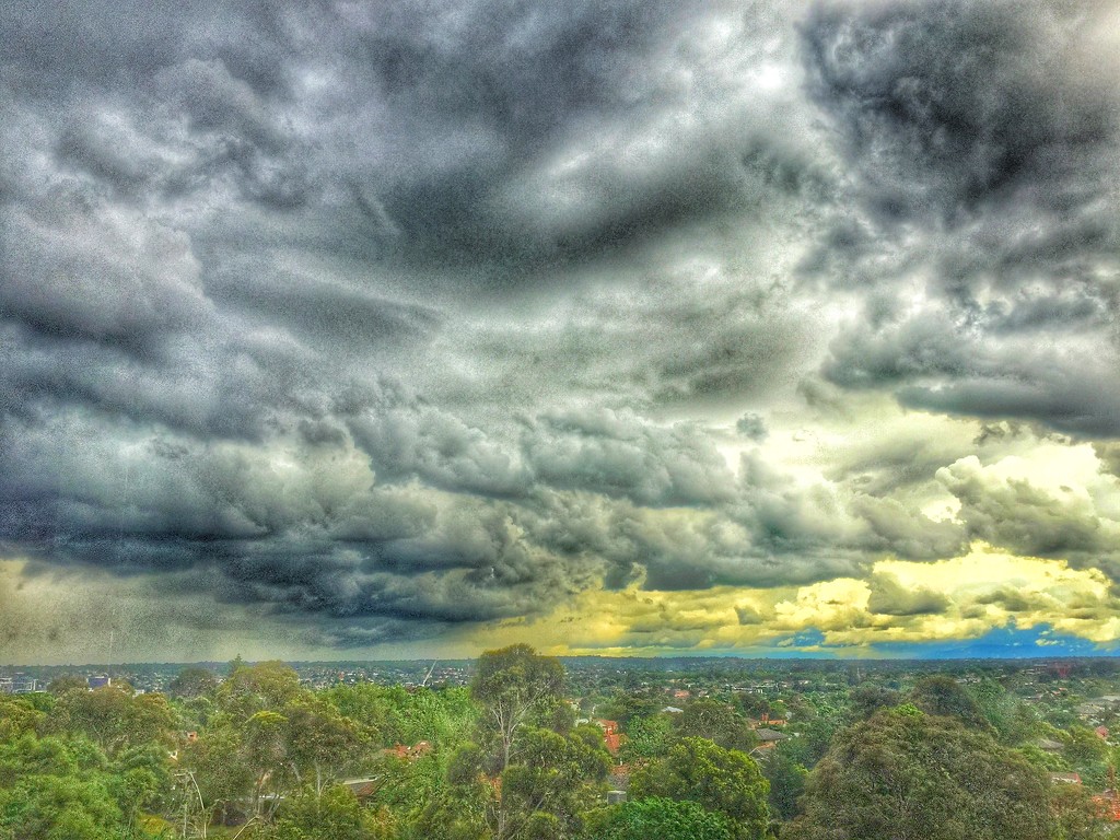 Stormy sky over the burbs by teodw