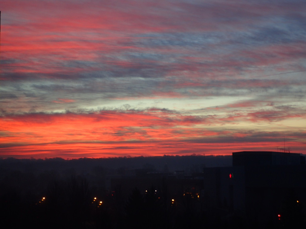 Sunrise from my Hotel Room by mattjcuk